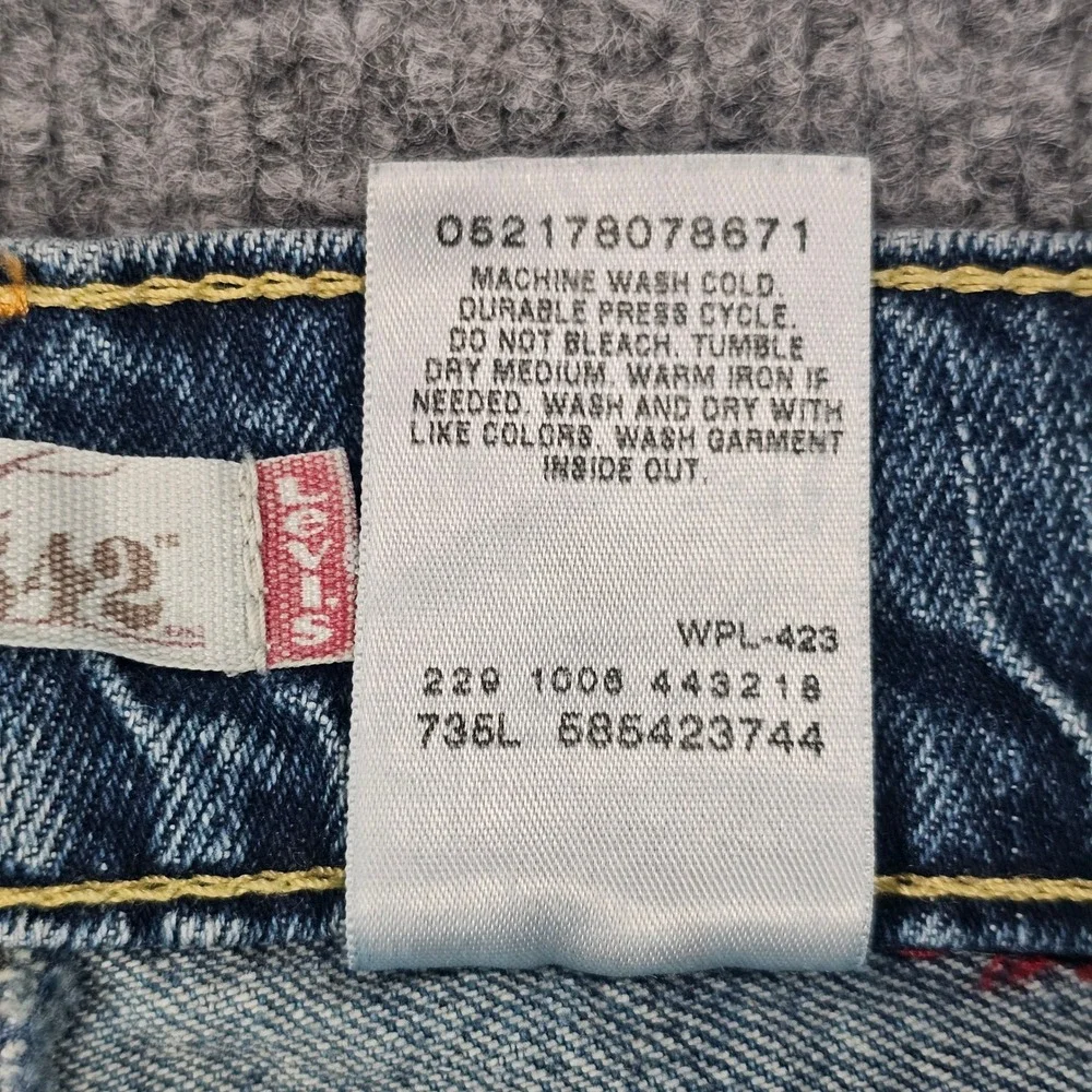 Vintage Levi's 542 Low Rise Flare Jeans Womens 12M Medium Wash Y2K Flap Pocket